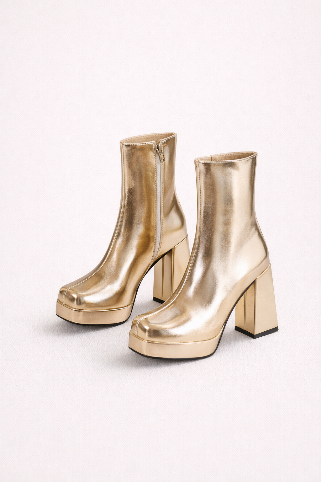 Amira Al-Sayed | Metallic Block Heel Ankle Boots