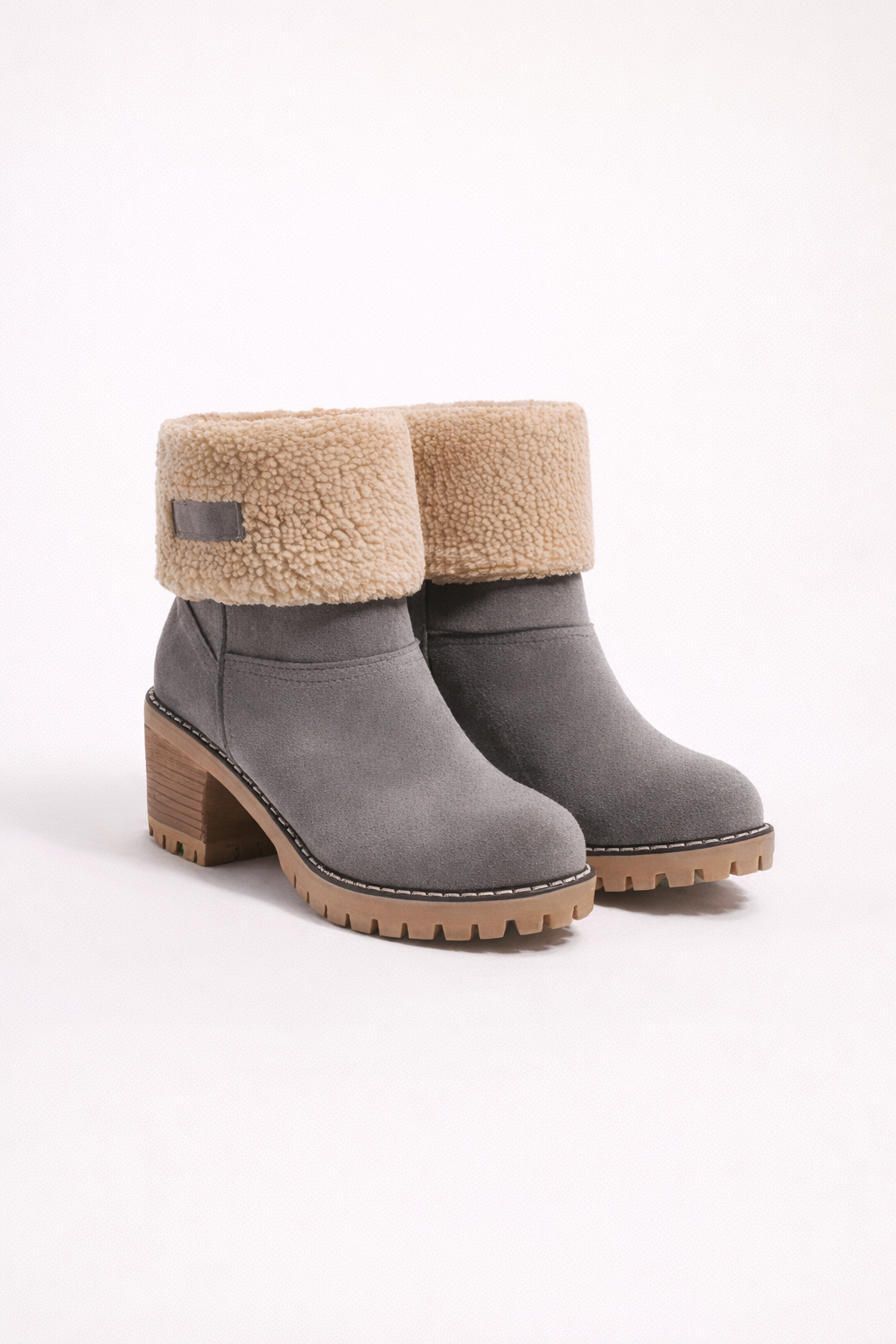 Grijze enkellaarsjes met shearling rand en stevige zool, warme winterlaarsjes met comfortabele hak.