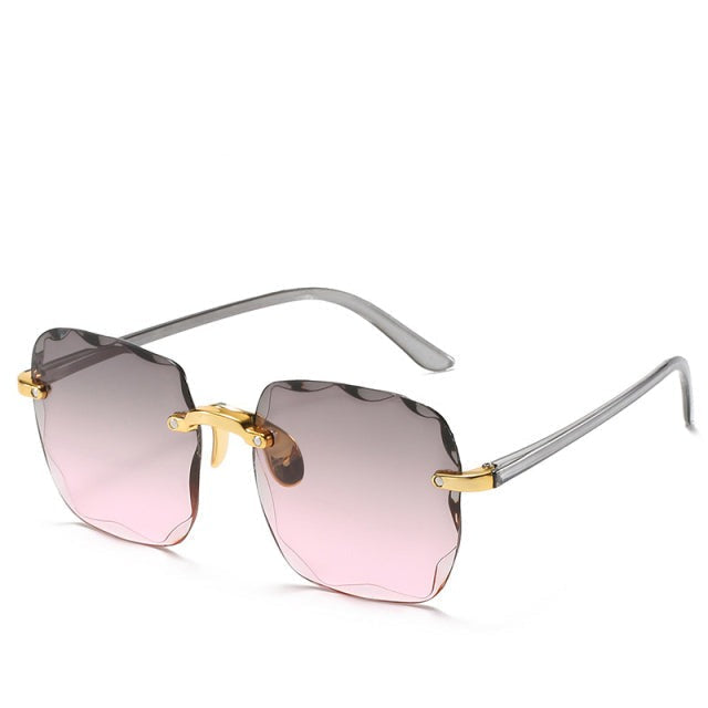 Valentina Castillo | Luxe Rimless Zonnebril met Gouden Details
